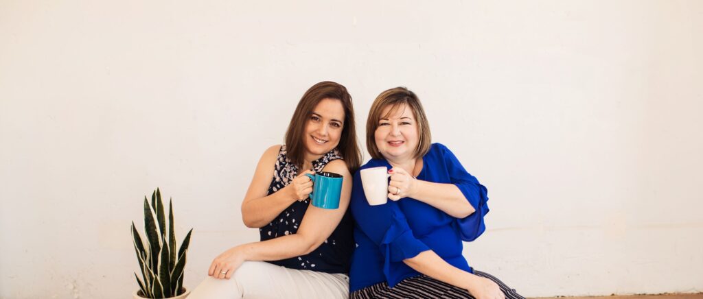 Melissa and coaching client with a cup of coffee.